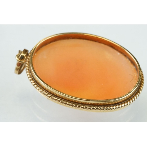 276 - 9ct yellow and rose gold portrait pendant fob, glazed panel verso, diameter approx 3cm; together wit... 