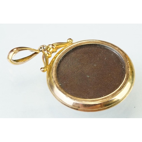 276 - 9ct yellow and rose gold portrait pendant fob, glazed panel verso, diameter approx 3cm; together wit... 