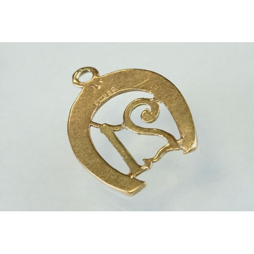 279 - Eight 9ct yellow gold charms together with two yellow metal charms (10)