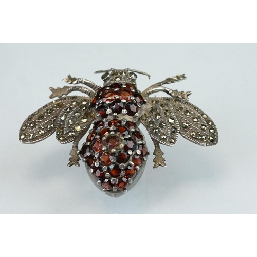 297 - Garnet and marcasite silver insect brooch, the body full set with round mixed cut garnets, the wings... 