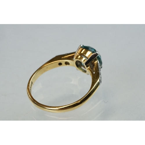 299 - Topaz and diamond 18ct yellow gold and platinum set ring, the round mixed cut blue topaz diameter ap... 