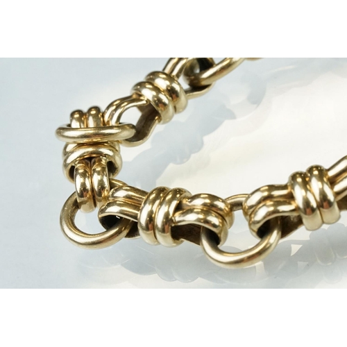 33 - 9ct yellow gold fancy link bracelet, lobster clasp, length approx 21cm