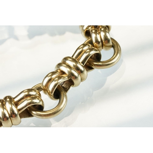 33 - 9ct yellow gold fancy link bracelet, lobster clasp, length approx 21cm