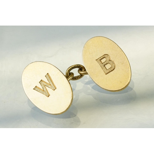 39A - Pair of 18ct yellow gold cufflinks, oval panels, plain polished design with engraved initials, chain... 