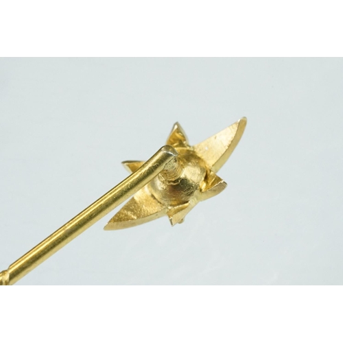 65 - Victorian diamond yellow metal stick pin, the star shaped head set with centre old cut diamond weigh... 