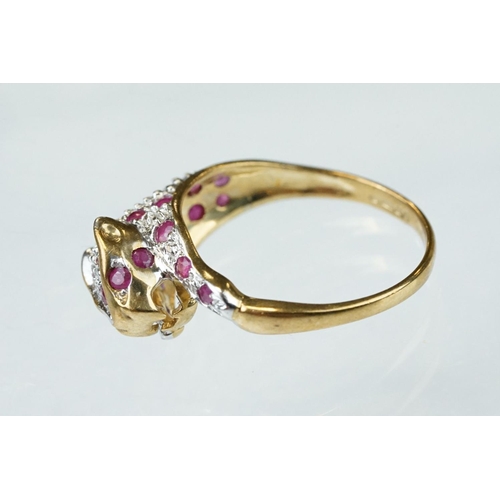 66 - Ruby and diamond 9ct yellow gold ring modelled as a leopard, small round mixed cut rubies, four smal... 