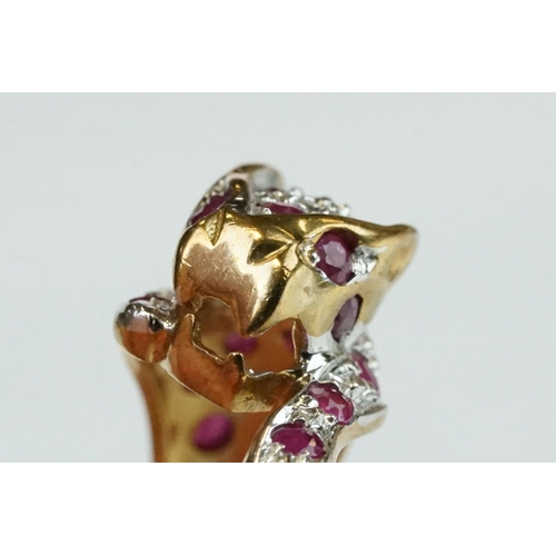 66 - Ruby and diamond 9ct yellow gold ring modelled as a leopard, small round mixed cut rubies, four smal... 