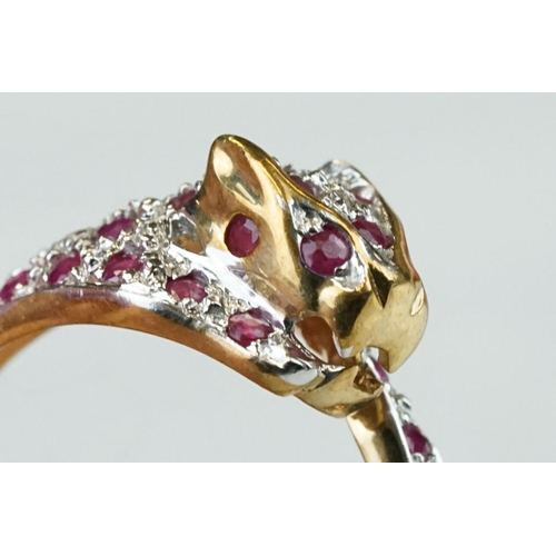 66 - Ruby and diamond 9ct yellow gold ring modelled as a leopard, small round mixed cut rubies, four smal... 