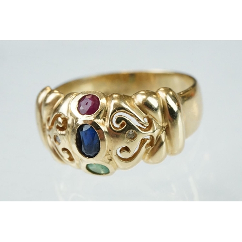 68 - Ruby, sapphire, emerald and diamond 14t yellow gold ring, the oval mixed cut sapphire measuring appr... 