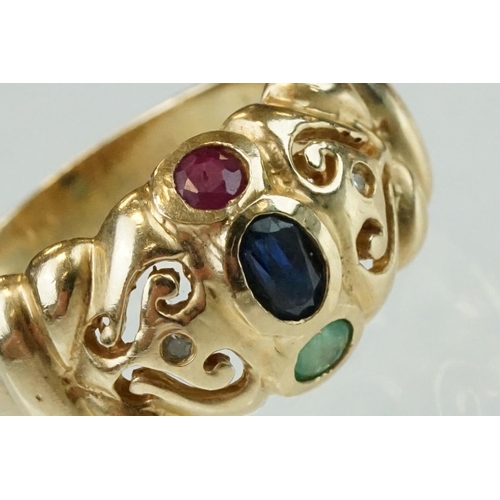 68 - Ruby, sapphire, emerald and diamond 14t yellow gold ring, the oval mixed cut sapphire measuring appr... 