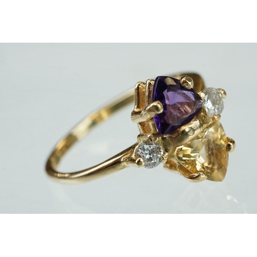 69 - Amethyst, citrine and diamond 14ct yellow gold ring, the trillion cut amethyst measuring approx 5.6m... 