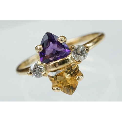 69 - Amethyst, citrine and diamond 14ct yellow gold ring, the trillion cut amethyst measuring approx 5.6m... 