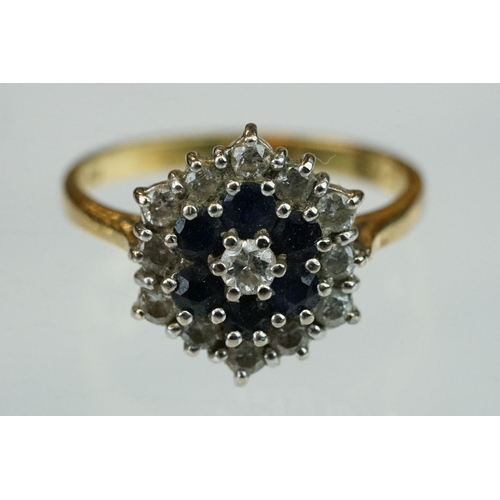 73 - Sapphire and diamond 18ct yellow gold cluster ring, the three tier cluster with round brilliant cut ... 