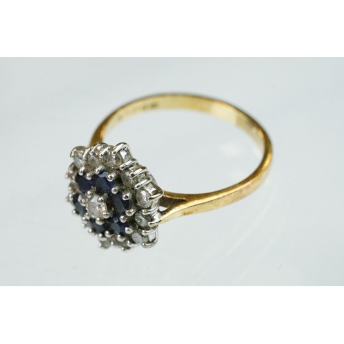 73 - Sapphire and diamond 18ct yellow gold cluster ring, the three tier cluster with round brilliant cut ... 