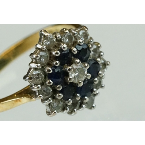 73 - Sapphire and diamond 18ct yellow gold cluster ring, the three tier cluster with round brilliant cut ... 