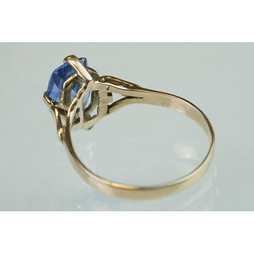 74 - Sapphire unmarked yellow gold ring, the cushion cut blue sapphire measuring approx 8.5mm x 7.0mm, fo... 