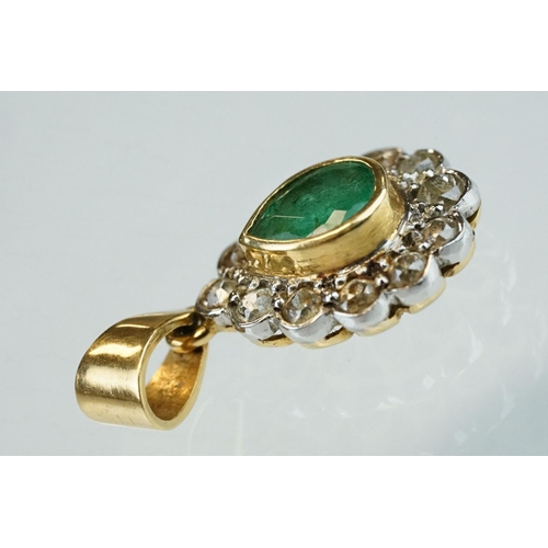 75 - Emerald and diamond unmarked yellow and white gold pendant, the pear shaped mixed cut emerald measur... 