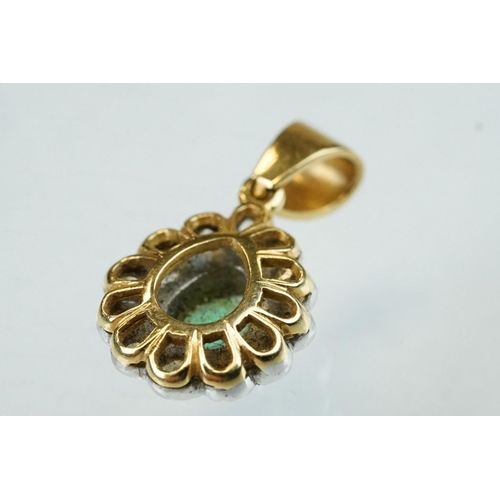 75 - Emerald and diamond unmarked yellow and white gold pendant, the pear shaped mixed cut emerald measur... 