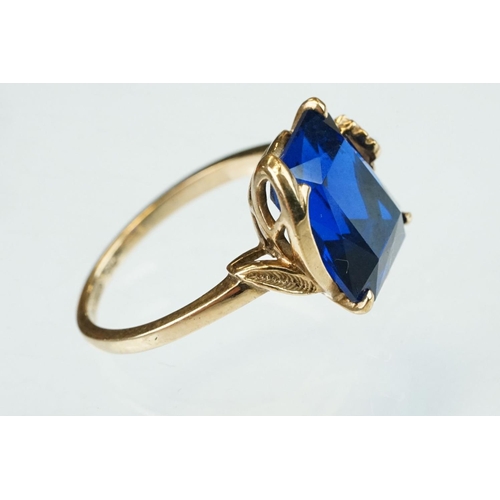 94 - Blue stone 9ct yellow gold dress ring, possibly synthetic blue spinel, size M½; together with two pa... 