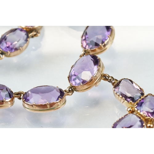 1 - 19th century amethyst unmarked rose gold riviere necklace, twenty-nine graduated oval mixed cut amet... 