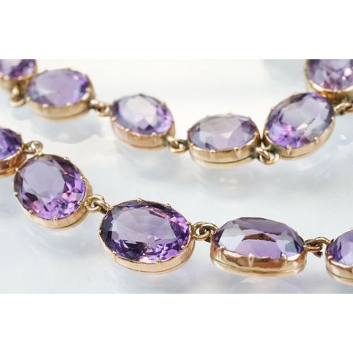 1 - 19th century amethyst unmarked rose gold riviere necklace, twenty-nine graduated oval mixed cut amet... 