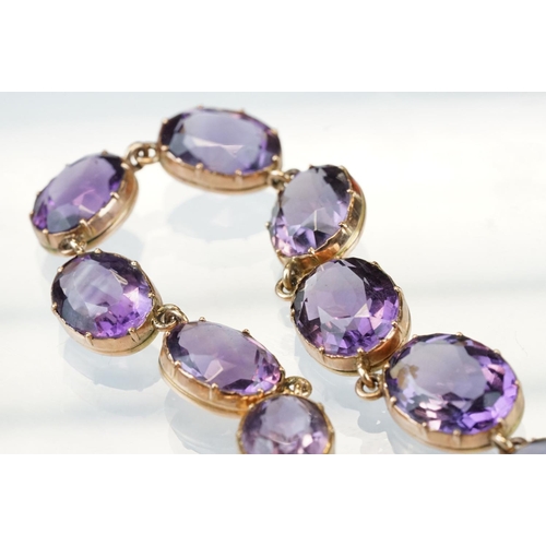 1 - 19th century amethyst unmarked rose gold riviere necklace, twenty-nine graduated oval mixed cut amet... 