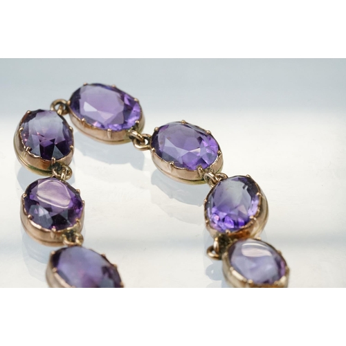 1 - 19th century amethyst unmarked rose gold riviere necklace, twenty-nine graduated oval mixed cut amet... 