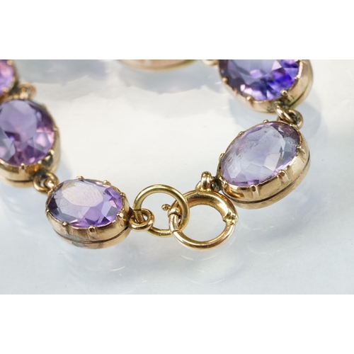 1 - 19th century amethyst unmarked rose gold riviere necklace, twenty-nine graduated oval mixed cut amet... 