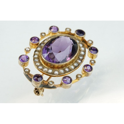 11 - Late 19th century amethyst and seed pearl 9ct yellow gold brooch, the principal oval mixed cut ameth... 