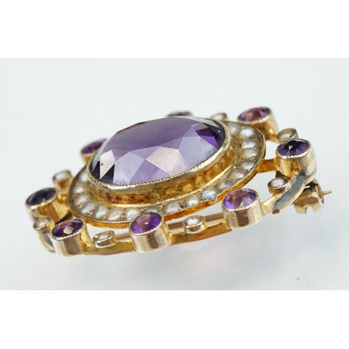 11 - Late 19th century amethyst and seed pearl 9ct yellow gold brooch, the principal oval mixed cut ameth... 