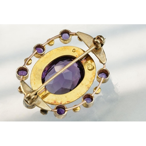 11 - Late 19th century amethyst and seed pearl 9ct yellow gold brooch, the principal oval mixed cut ameth... 