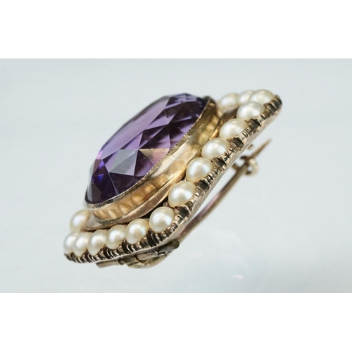 13 - Amethyst and pearl yellow metal brooch, the oval mixed cut amethyst measuring approx 13.5mm x 18.5mm... 