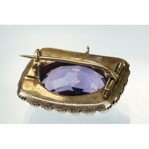 13 - Amethyst and pearl yellow metal brooch, the oval mixed cut amethyst measuring approx 13.5mm x 18.5mm... 