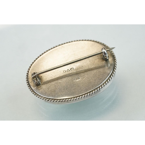 25 - Early 20th century Charles Horner silver brooch with Ruskin style ceramc roundel, rubover set with r... 