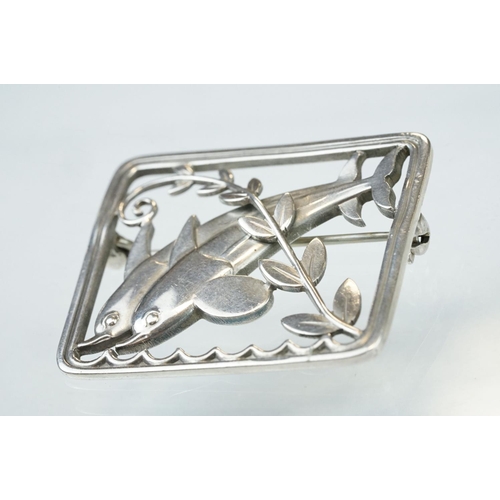 26 - Arno Malinowski for Georg Jensen silver brooch, pattern no. 251, modelled as a pair of diving dolphi... 