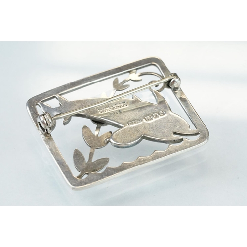 26 - Arno Malinowski for Georg Jensen silver brooch, pattern no. 251, modelled as a pair of diving dolphi... 