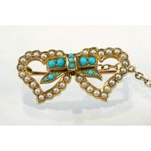 27 - Edwardian turquoise and seed pearl unmarked yellow gold sweetheart brooch modelled and two hearts wi... 