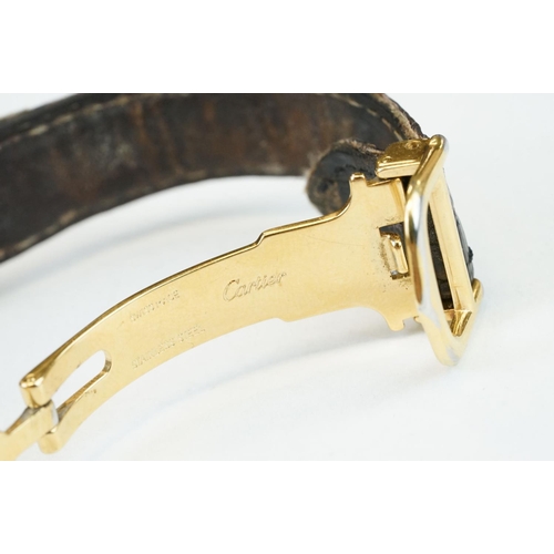 371A - Must de Cartier tank vermeil silver gilt wristwatch, cream dial with black Roman numerals and gilt b... 