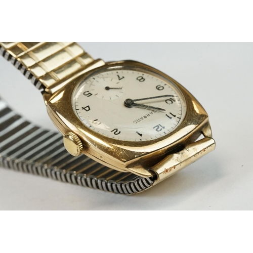 374 - Garrard 9ct yellow gold cased gents wristwatch with silvered seconds dial, Arabic numerals, presenta... 