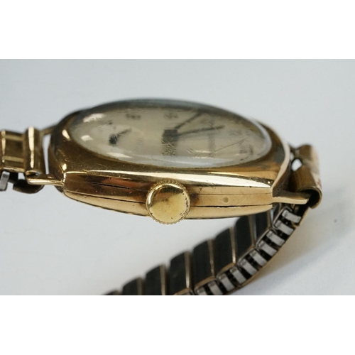 374 - Garrard 9ct yellow gold cased gents wristwatch with silvered seconds dial, Arabic numerals, presenta... 