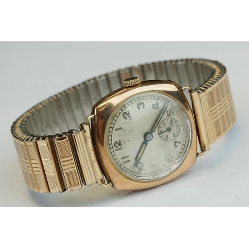 375 - 9ct Rose gold cased gents watch with cream dial and seconds dial, Arabic numerals and rolled gold st... 