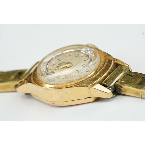 378 - MuDu 18ct gold cased wristwatch, circular champagne dial, gilt Arabic and baton numerals, gilt penci... 