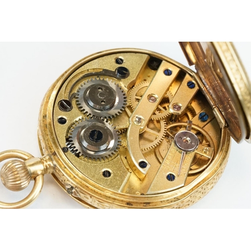 381 - 18ct yellow gold key wind open face small pocket watch, gilt dial with bright cut decoration to cent... 