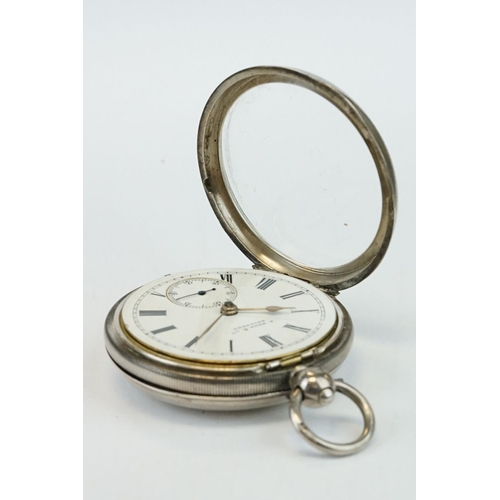 383 - Two early 20th century silver open faced key wind pocket watches with engine turned cases and blank ... 