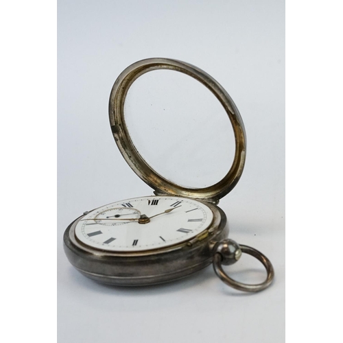 383 - Two early 20th century silver open faced key wind pocket watches with engine turned cases and blank ... 