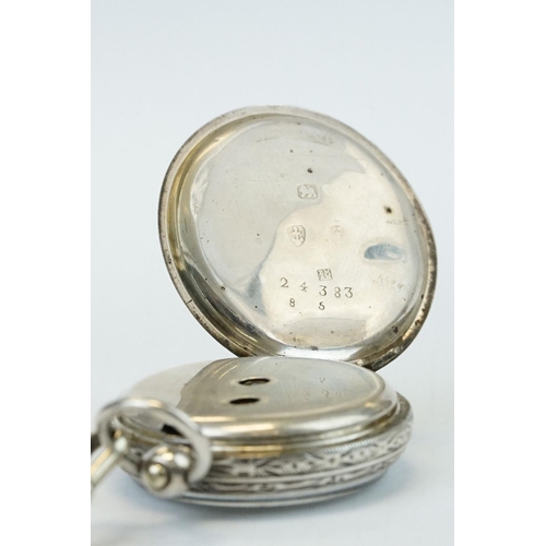 387A - Silver open face key wind fob watch with enamel dial, Roman numerals and an engraved case with blank... 