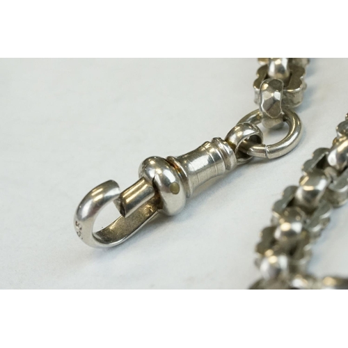 393 - Two Silver albert watch chains to include a silver curb link example, with clasp (stamped to each li... 