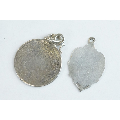 404 - 14 silver watch fobs and medals, mostly stamped sterling or silver, together with 3 white metal and ... 