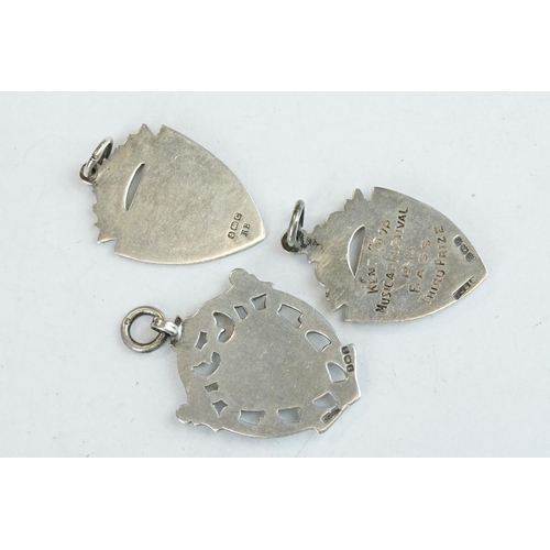 405 - 15 Silver hallmarked watch fobs, early to mid 20th century, featuring Chester hallmarked examples