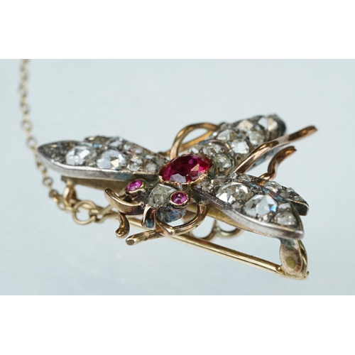 5 - 19th century ruby and diamond unmarked rose gold and silver brooch, the principal round mixed cut ru... 